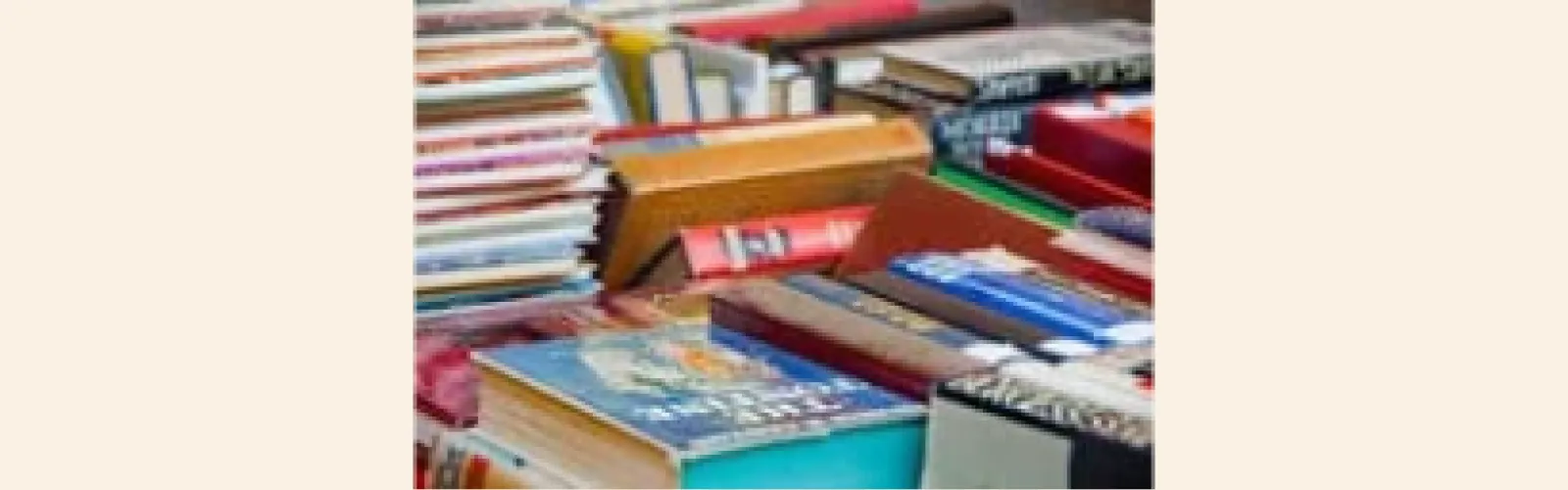 Stacks of books in various colors