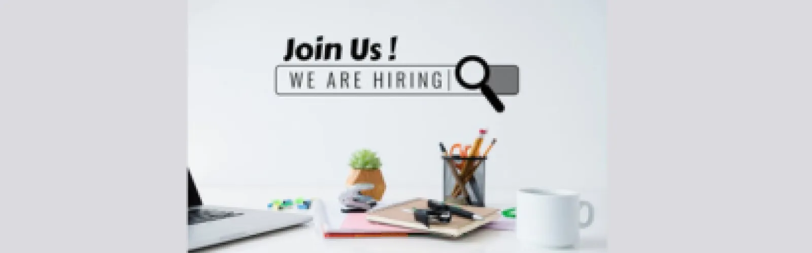 Join us! We are hiring with office supplies on a desk