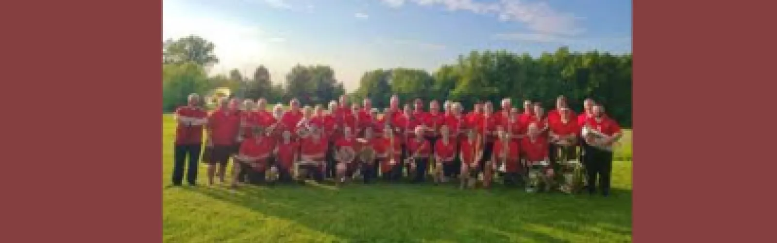 Canfield Community Concert Band on red background