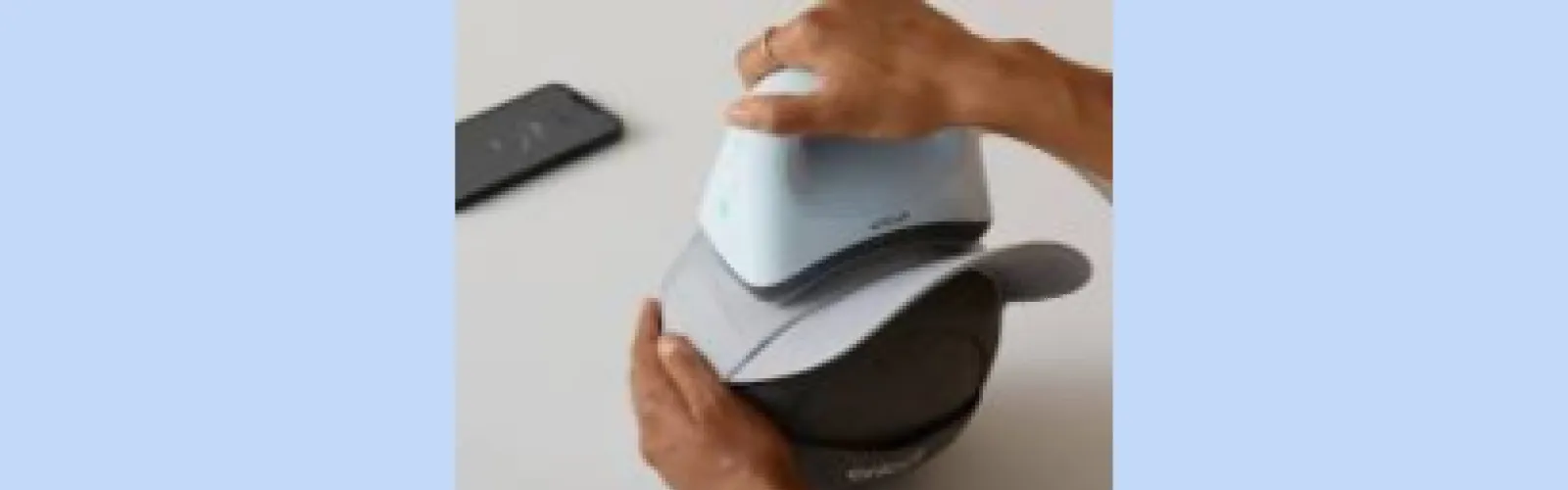 Pressing a design on a hat using a Cricut Hat Press